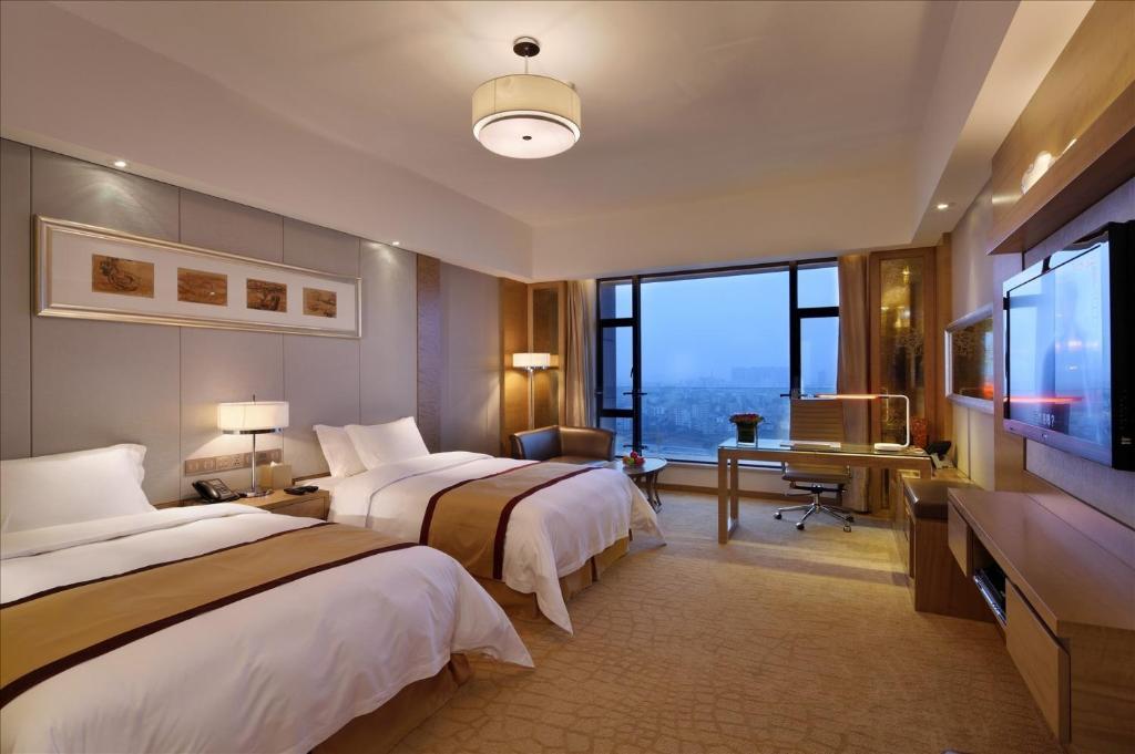 Sovereign Hotel Zhanjiang Kamer foto